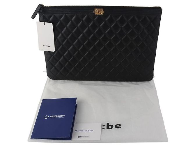 Clutch Boy Chanel Caviar Gold Large - vista 7