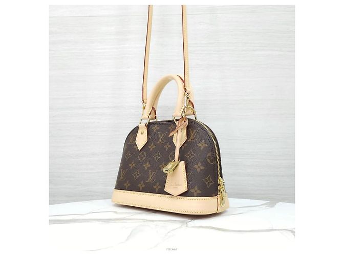 Louis Vuitton Borsa Tote Alma BB Monogram a Spalla e Mano - vista 2