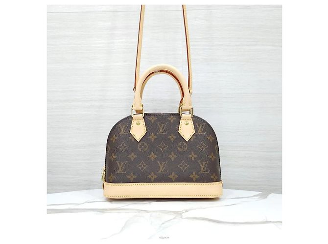 Louis Vuitton Borsa Tote Alma BB Monogram a Spalla e Mano - vista 3