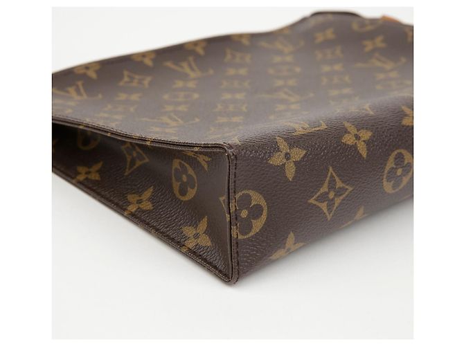 Louis Vuitton Clutch Toiletry Monogram Canvas - vista 7