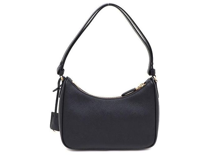 Prada Mini borsa tote e borsa a tracolla in pelle Saffiano nera con logo triangolo dorato e tracolla - vista 3
