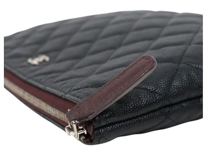 Chanel Clutch in pelle caviar nera - vista 10