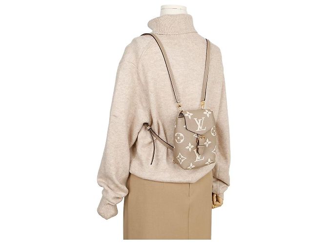 Louis Vuitton Tiny Backpack Zaino in pelle marrone - vista 12