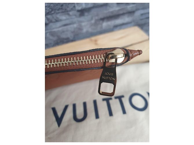 Louis Vuitton Neverfull MM Monogram Empreinte Pelle Cognac - vista 4