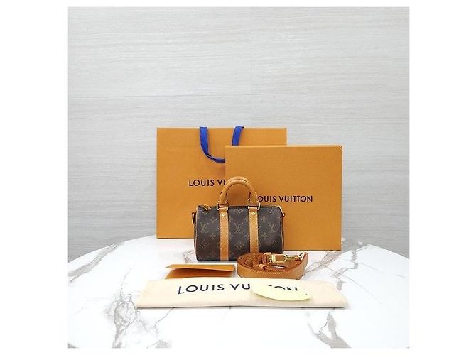 Louis Vuitton Nano Keepall Monogram Archive - vista 9
