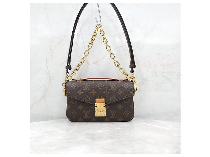 Metis Louis Vuitton Pochette Métis East West - vista 11
