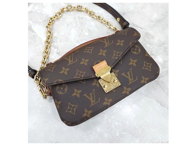 Metis Louis Vuitton Pochette Métis East West - vista 13
