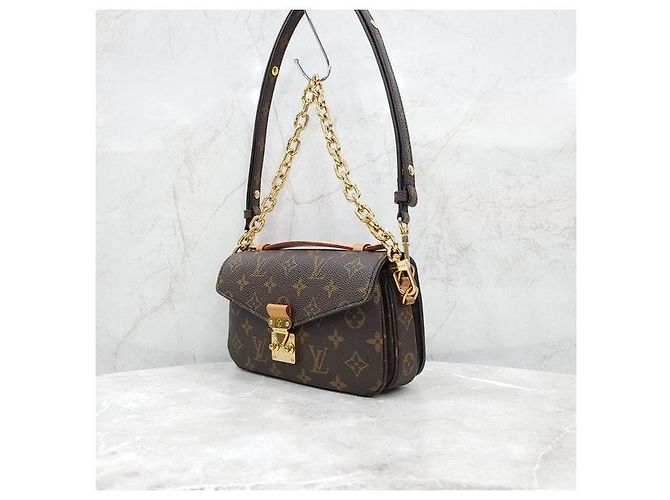 Metis Louis Vuitton Pochette Métis East West - vista 2