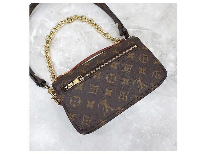 Metis Louis Vuitton Pochette Métis East West - vista 6
