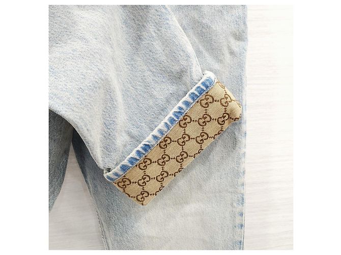 Gucci Pantaloni in denim dritti con risvolto e logo GG - vista 13