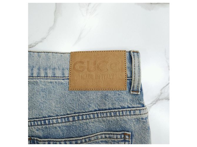 Gucci Pantaloni in denim dritti con risvolto e logo GG - vista 14