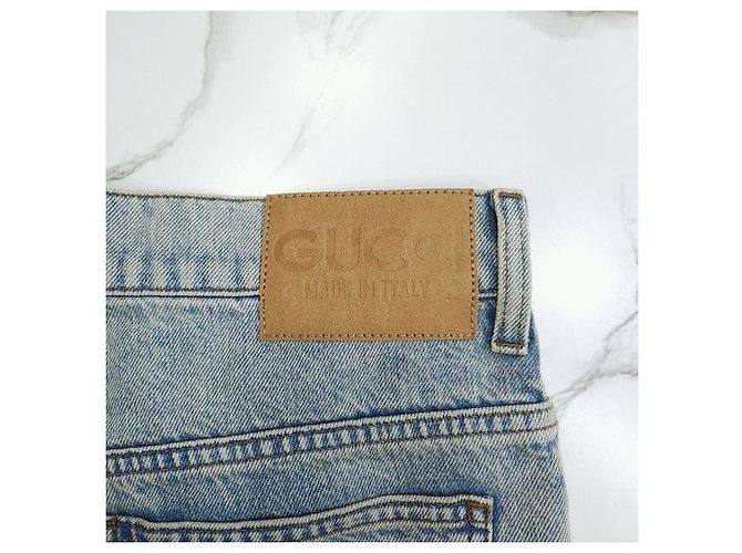 Gucci Pantaloni in denim dritti con risvolto e logo GG - vista 6