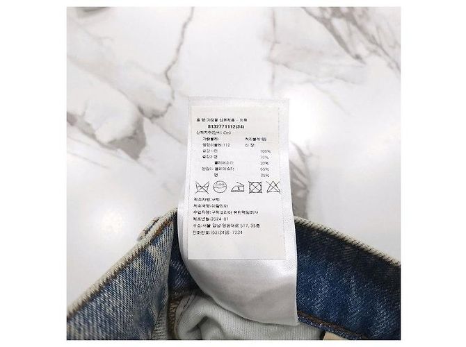 Gucci Pantaloni in denim dritti con risvolto e logo GG - vista 8