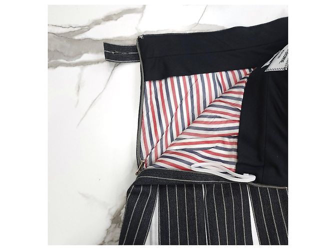 Louis Vuitton Minifalda plisada de lana con rayas diplomáticas - vista 15