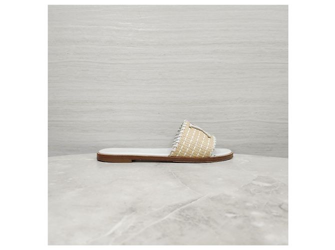Louis Vuitton Sandali mule in rafia Monogram - vista 11