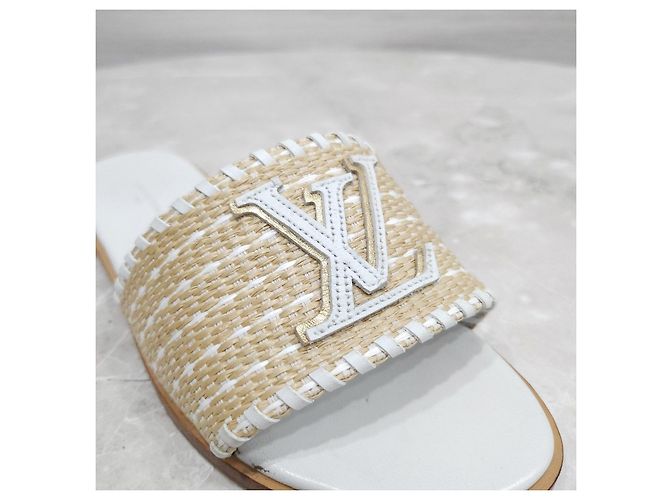 Louis Vuitton Sandali mule in rafia Monogram - vista 13