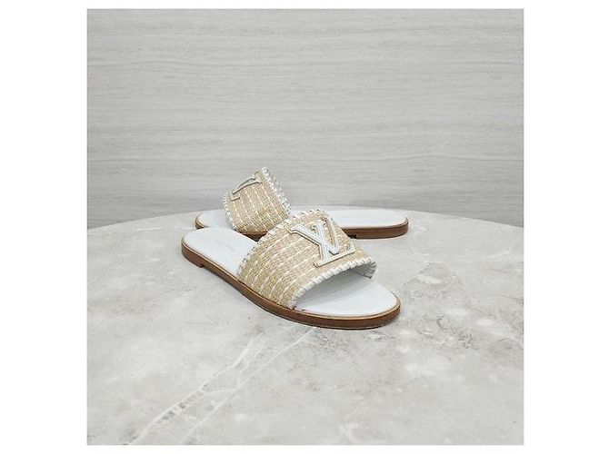 Louis Vuitton Sandali mule in rafia Monogram - vista 3