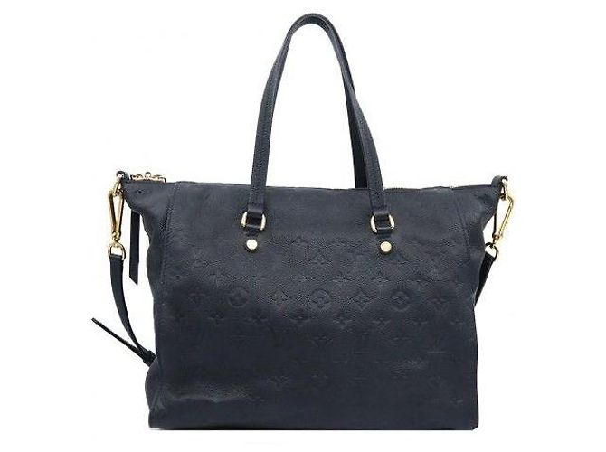 Louis Vuitton Monogram Empreinte Infini Lumineuse PM - vista 4