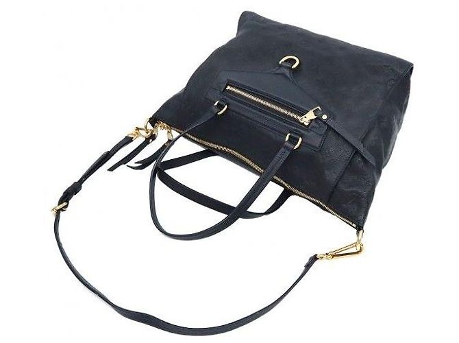 Louis Vuitton Monogram Empreinte Infini Lumineuse PM - vista 5