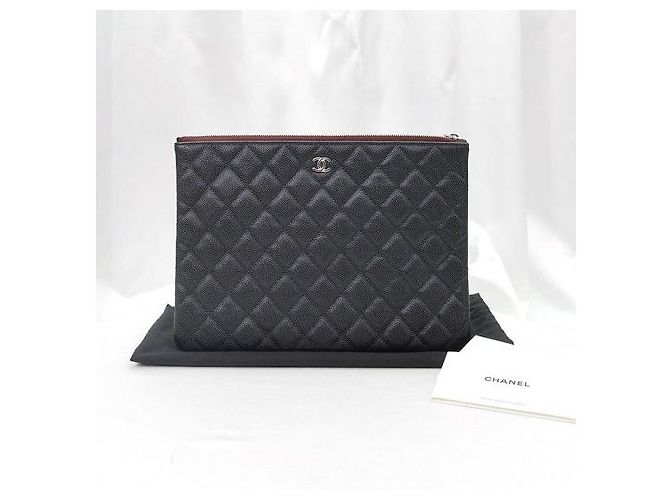 Chanel Serie Classic Caviar Gold Clutch - vista 2