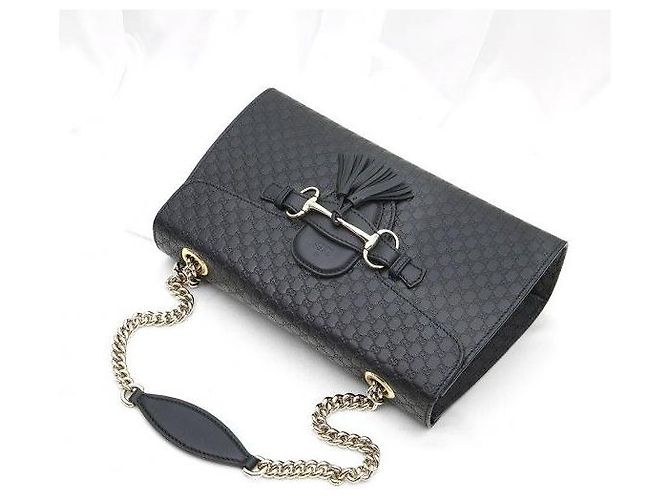 Borsa a tracolla Emily Micro Guccissima con morsetto e nappa Nera - vista 5
