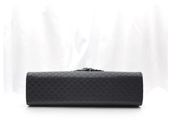 Borsa a tracolla Emily Micro Guccissima con morsetto e nappa Nera - vista 6
