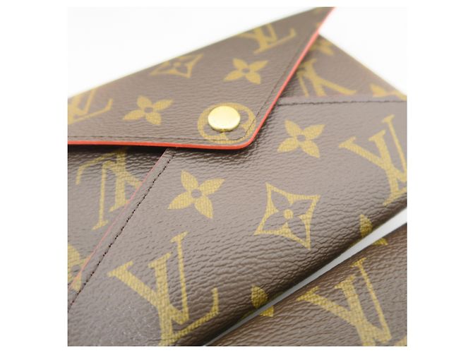 Louis Vuitton Pouch Kirigami in Monogram Canvas - vista 7