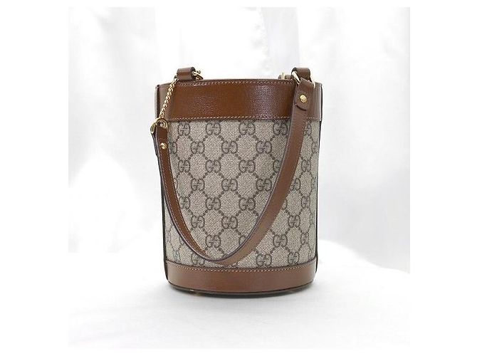 Gucci Borsa a secchiello a tracolla in pelle marrone con morsetto - vista 4