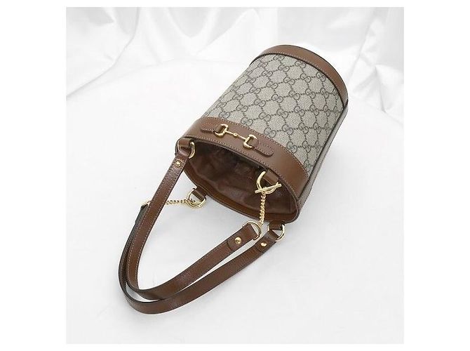 Gucci Borsa a secchiello a tracolla in pelle marrone con morsetto - vista 5