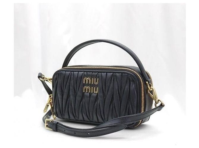 Miu Miu Tote in Napa Matelassé nera e oro - vista 3