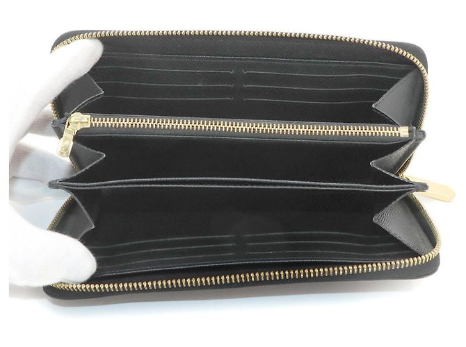 Cartera Louis Vuitton Epi Zippy - vista 6