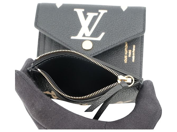 Portafoglio tri-fold Louis Vuitton in Cream e Noir - vista 6