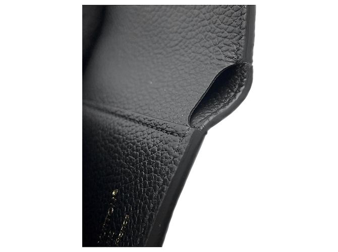 Portafoglio tri-fold Louis Vuitton in Cream e Noir - vista 7