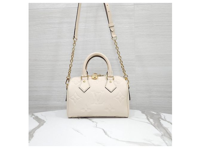 Louis Vuitton Speedy Bandoulière Monogram Empreinte Creme - vista 10