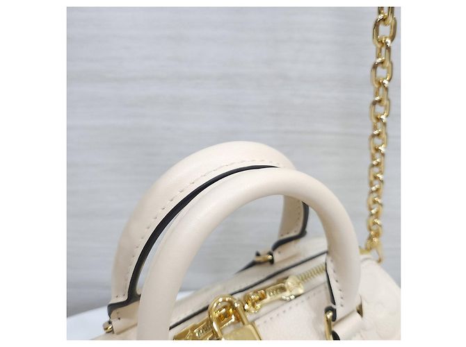 Louis Vuitton Speedy Bandoulière Monogram Empreinte Creme - vista 13