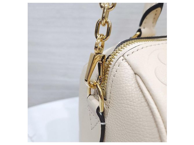 Louis Vuitton Speedy Bandoulière Monogram Empreinte Creme - vista 14