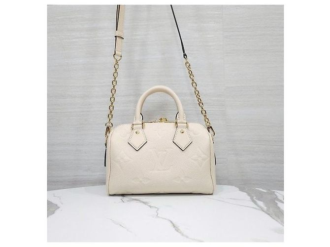 Louis Vuitton Speedy Bandoulière Monogram Empreinte Creme - vista 3