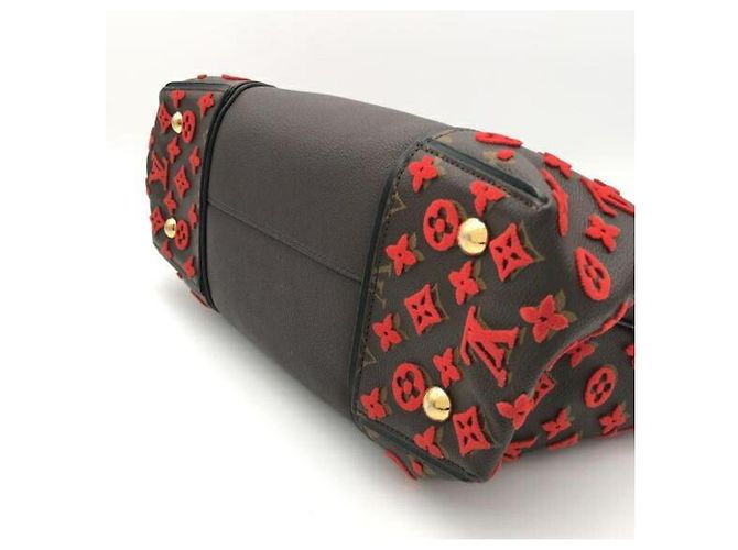 Borsa a mano Louis Vuitton rossa e marrone - vista 4