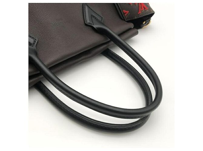 Borsa a mano Louis Vuitton rossa e marrone - vista 5