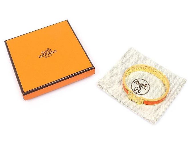 Hermès Bracciale Click Golden Yellow Click Asu PM da donna - vista 2
