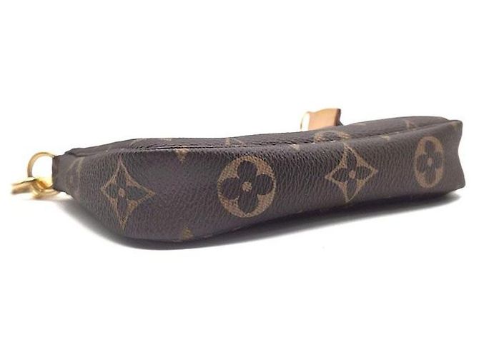 Louis Vuitton Monogram Mini Pochette Accessoires - vista 7