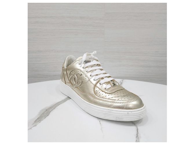 Chanel Sneakers dorate laminate - vista 13