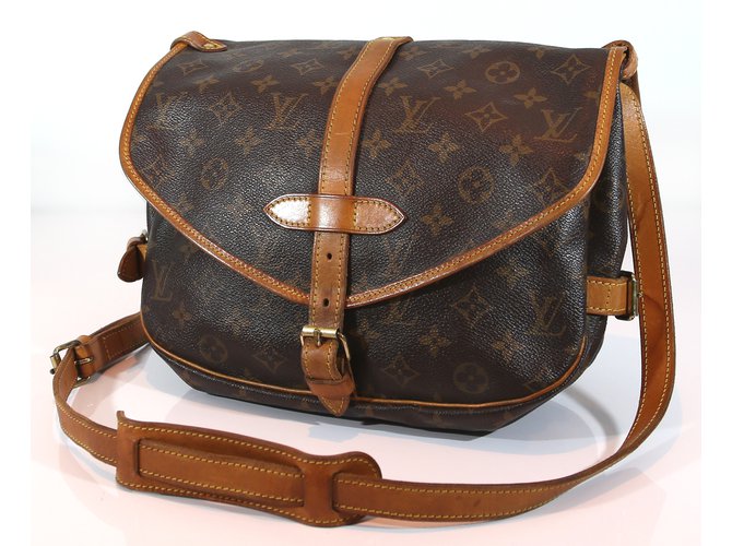 Saumur Louis Vuitton Handbags Brown Cloth  ref.6440