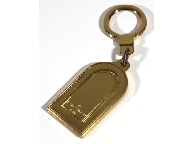 Louis Vuitton Telefon Reize Golden Metall  ref.6464