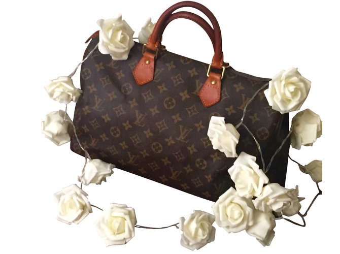 Speedy Louis Vuitton Handbags Caramel Leather  ref.7305
