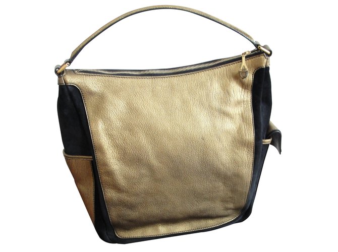 Yves Saint Laurent Handbags Golden Leather  ref.8386