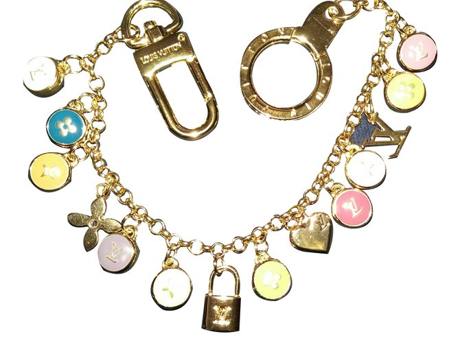 Louis Vuitton Amuletos bolsa Dorado Metal  ref.18384