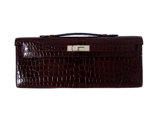 Kelly Hermès Clutch bags Dark red Exotic leather  ref.20410