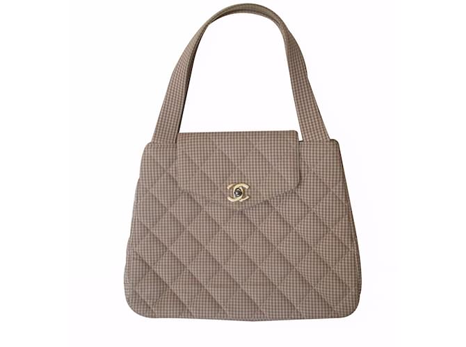 Chanel Handbags Beige Cloth  ref.22111