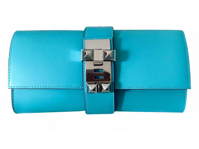 Hermès Clutch bags Blue Leather  ref.22117